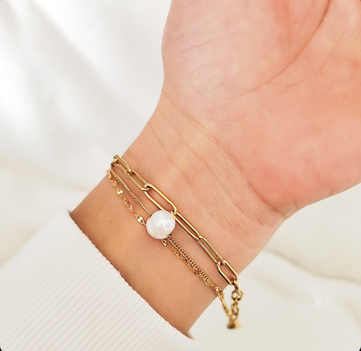 Bracelet triplé rang avec perle