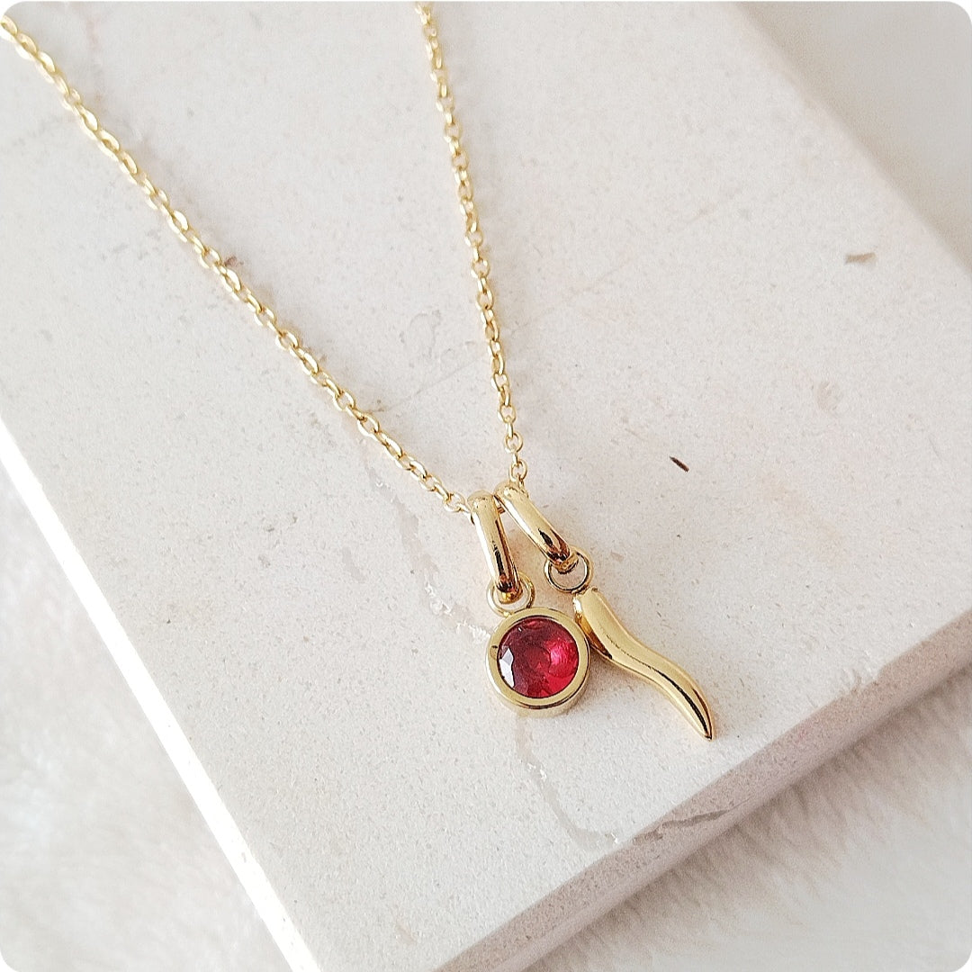 Collier Luck piment avec une pierre rouge