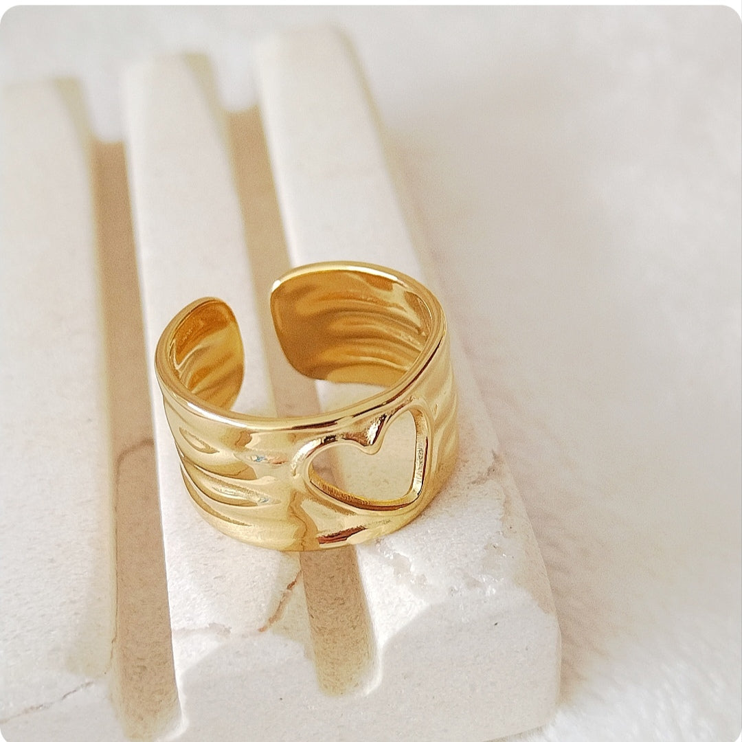 Bague cœur transpercé