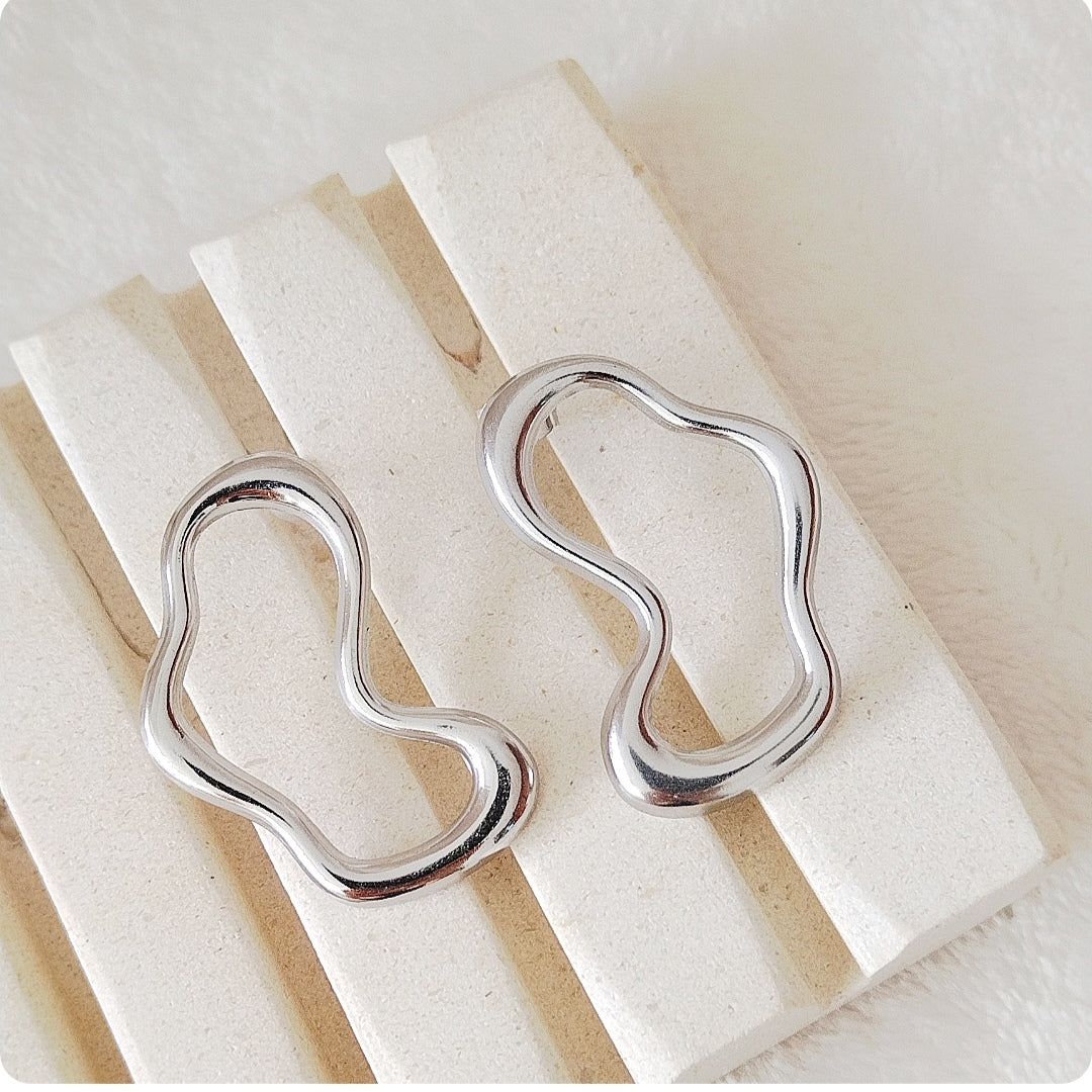 Boucles d'oreilles cercle fondue