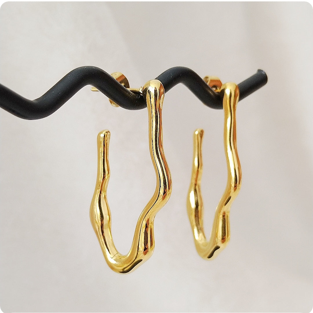 Boucles d'oreilles fondues