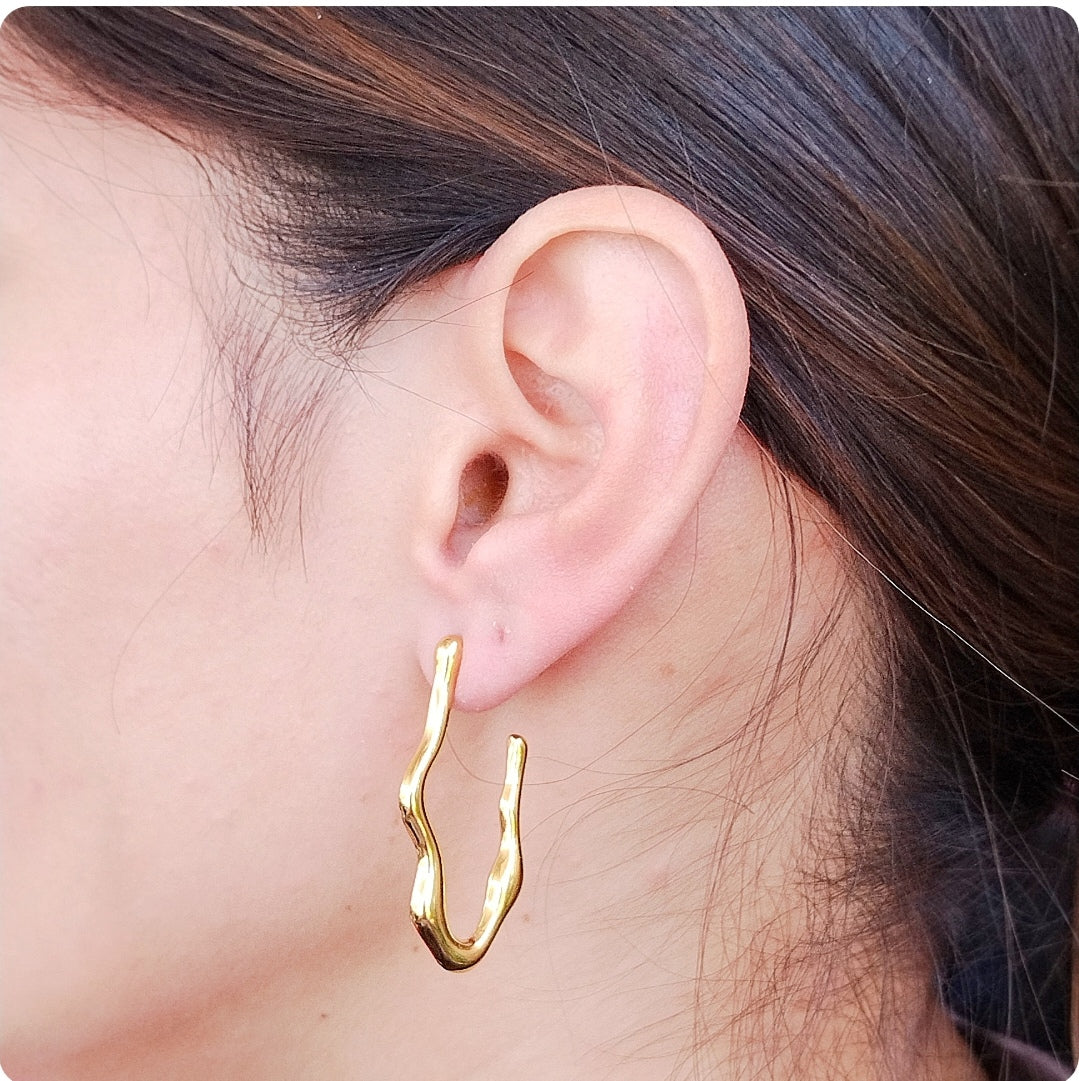 Boucles d'oreilles fondues