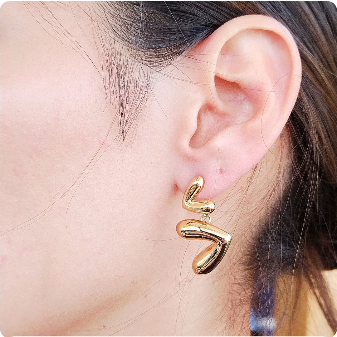 Boucles d'oreilles double cœur