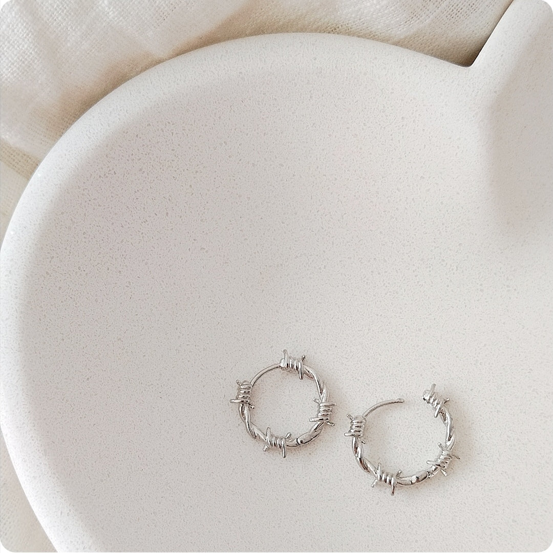 Boucles d'oreilles fil de fer barbelé