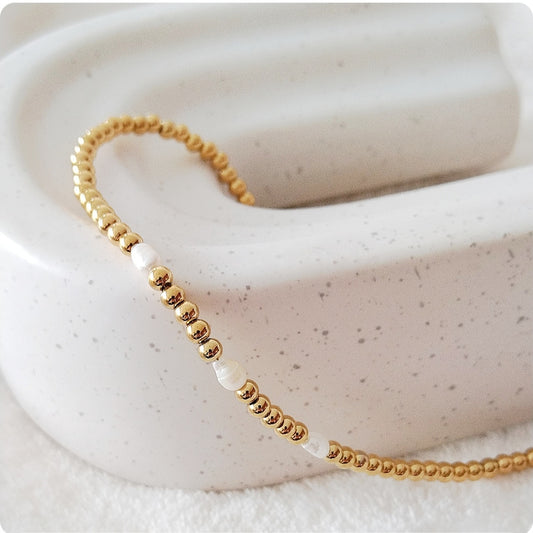Collier billes dorées et perles