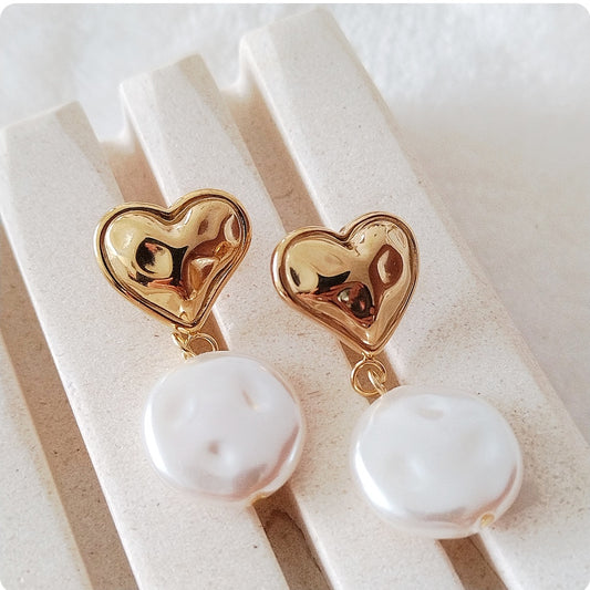 Boucles d'oreilles  avec cœur dorée et perle