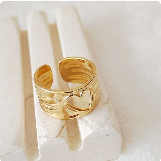 Bague cœur transpercé