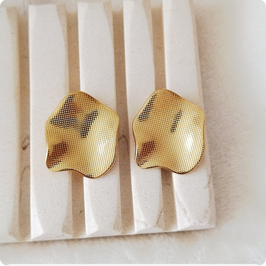 Boucles d'oreilles grands dorées texturées